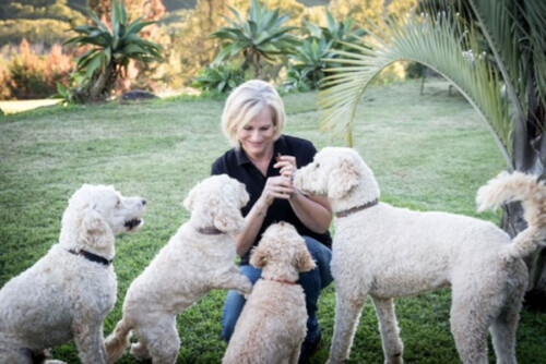 Dr. Macintyre with her four dogs